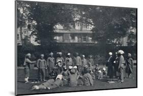 'Convalescent Indian Soldiers Playing Quoits on the Eastern Lawns', c1915, (1939)-Unknown-Mounted Photographic Print
