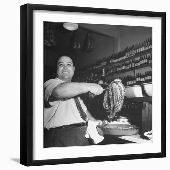 Cook in the Napoli Restaurant Holding up an Octopus, a Delicacy in Argentina-Thomas D^ Mcavoy-Framed Premium Photographic Print