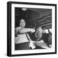 Cook in the Napoli Restaurant Holding up an Octopus, a Delicacy in Argentina-Thomas D^ Mcavoy-Framed Photographic Print