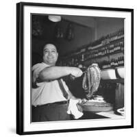 Cook in the Napoli Restaurant Holding up an Octopus, a Delicacy in Argentina-Thomas D^ Mcavoy-Framed Photographic Print