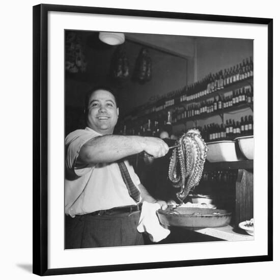 Cook in the Napoli Restaurant Holding up an Octopus, a Delicacy in Argentina-Thomas D^ Mcavoy-Framed Photographic Print