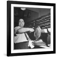 Cook in the Napoli Restaurant Holding up an Octopus, a Delicacy in Argentina-Thomas D^ Mcavoy-Framed Photographic Print