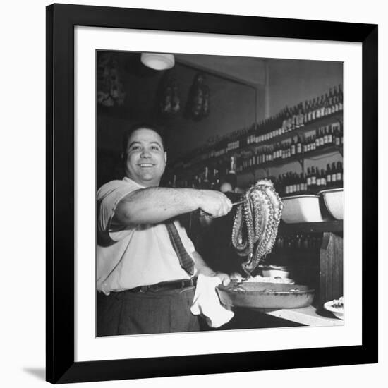 Cook in the Napoli Restaurant Holding up an Octopus, a Delicacy in Argentina-Thomas D^ Mcavoy-Framed Photographic Print