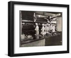 Cooks at the Broiler in the Kitchen of the Hotel Commodore, 1919-Byron Company-Framed Giclee Print