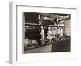 Cooks at the Broiler in the Kitchen of the Hotel Commodore, 1919-Byron Company-Framed Giclee Print