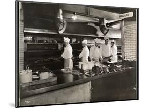 Cooks at the Broiler in the Kitchen of the Hotel Commodore, 1919-Byron Company-Mounted Giclee Print