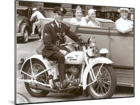 Cop on Motorcycle in Parade-null-Mounted Art Print