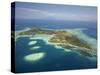 Coral Reef and Malolo Lailai Island, Mamanuca Islands, Fiji-David Wall-Stretched Canvas