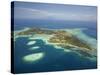 Coral Reef and Malolo Lailai Island, Mamanuca Islands, Fiji-David Wall-Stretched Canvas