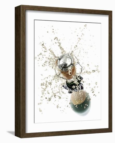 Cork Flying Out of a Sparkling Wine Bottle-Kröger & Gross-Framed Photographic Print