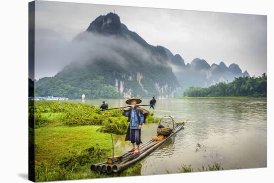 Cormorant Fisherman and His Birds on the Li River in Yangshuo, Guangxi, China.-SeanPavonePhoto-Stretched Canvas