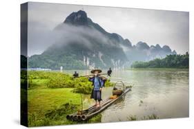 Cormorant Fisherman and His Birds on the Li River in Yangshuo, Guangxi, China.-SeanPavonePhoto-Stretched Canvas