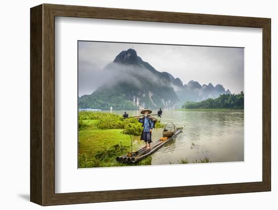 Cormorant Fisherman and His Birds on the Li River in Yangshuo, Guangxi, China.-SeanPavonePhoto-Framed Photographic Print