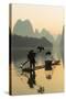 Cormorant Fisherman on Li River at Dawn, Xingping, Yangshuo, Guangxi, China-Ian Trower-Stretched Canvas