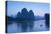 Cormorant Fisherman on Li River at Dusk, Xingping, Yangshuo, Guangxi, China-Ian Trower-Stretched Canvas