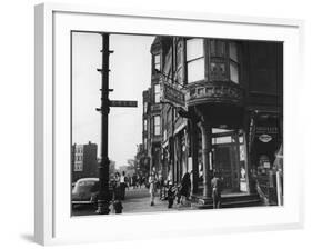 Corner Drugstore and Pedestrian Traffic on W. Oak St. in the Italian Section of Chicago-Gordon Coster-Framed Photographic Print