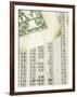 Corner of American Dollar Bill on Newspaper Stock Market Report-null-Framed Photographic Print