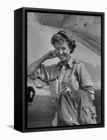 Correspondent Marguerite Higgins Smiling, Leaning Against Airplane-Carl Mydans-Framed Stretched Canvas