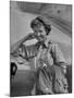 Correspondent Marguerite Higgins Smiling, Leaning Against Airplane-Carl Mydans-Mounted Photographic Print