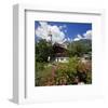 Cottage Garden at Polznkaspar House with Parish Church of St. Martin-null-Framed Premium Giclee Print