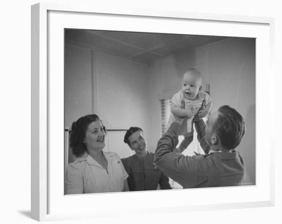 Country Doctor Ernest Ceriani Giving Checkup to 8 Month Old Infant Mike Huffaker-W^ Eugene Smith-Framed Photographic Print