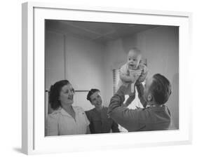 Country Doctor Ernest Ceriani Giving Checkup to 8 Month Old Infant Mike Huffaker-W^ Eugene Smith-Framed Photographic Print