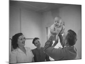 Country Doctor Ernest Ceriani Giving Checkup to 8 Month Old Infant Mike Huffaker-W^ Eugene Smith-Mounted Photographic Print