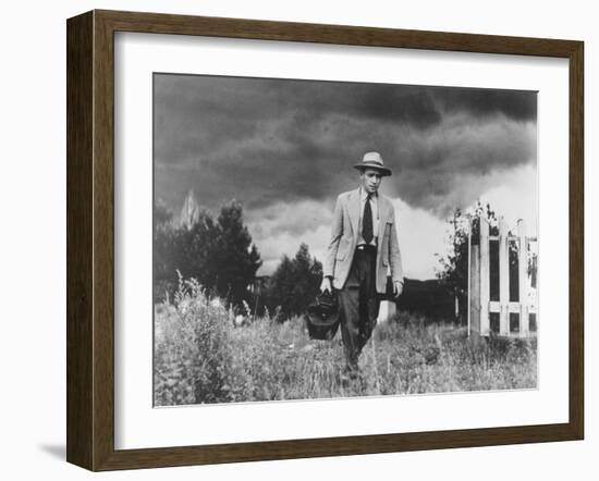 Country Doctor Ernest Ceriani Making House Call on Foot in Small Town-W^ Eugene Smith-Framed Photographic Print