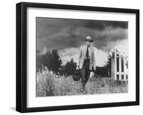 Country Doctor Ernest Ceriani Making House Call on Foot in Small Town-W^ Eugene Smith-Framed Photographic Print