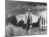 Country Doctor Ernest Ceriani Making House Call on Foot in Small Town-W^ Eugene Smith-Mounted Photographic Print