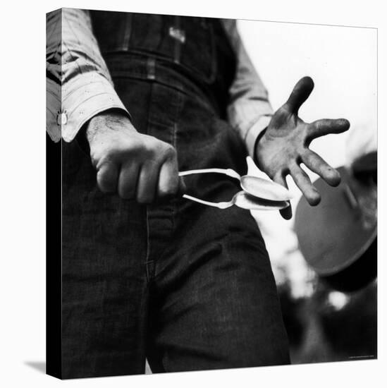 Country Music: Close Up of Spoons Being Played by Man in Overalls-Eric Schaal-Stretched Canvas