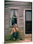 Country Musician, Fred Price, Sitting Outdoors in Front of Old House Playing the Fiddle-Michael Mauney-Mounted Photographic Print