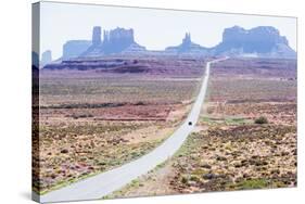 Country road, Monument Valley, Arizona, North America-Marco Simoni-Stretched Canvas