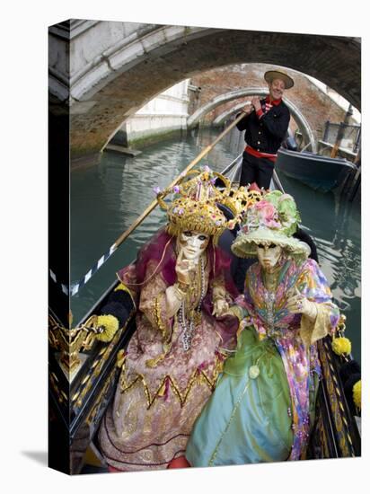 Couple at the Annual Carnival Festival Enjoy Gondola Ride, Venice, Italy-Jim Zuckerman-Stretched Canvas