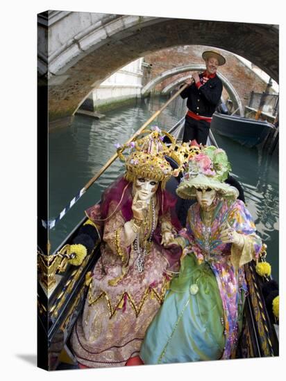 Couple at the Annual Carnival Festival Enjoy Gondola Ride, Venice, Italy-Jim Zuckerman-Stretched Canvas