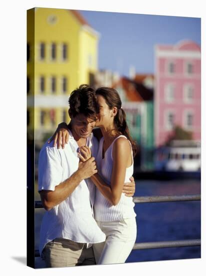 Couple at the Willemstad Waterfront, Curacao, Caribbean-Greg Johnston-Stretched Canvas