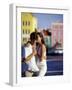 Couple at the Willemstad Waterfront, Curacao, Caribbean-Greg Johnston-Framed Photographic Print