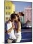 Couple at the Willemstad Waterfront, Curacao, Caribbean-Greg Johnston-Mounted Photographic Print
