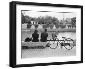 Couple by the Kyobashigawa River, Hiroshima, Japan-Walter Bibikow-Framed Photographic Print