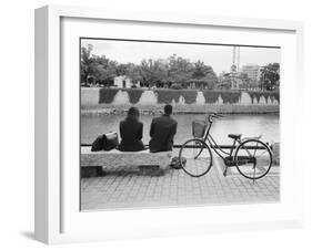 Couple by the Kyobashigawa River, Hiroshima, Japan-Walter Bibikow-Framed Photographic Print