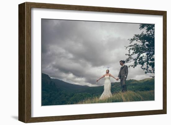 Couple Celebrating their Marriage-Clive Nolan-Framed Photographic Print