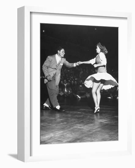 Couple Dancing in a Jitterbug Contest-null-Framed Photographic Print