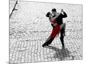 Couple dancing Tango on cobblestone road-null-Mounted Art Print