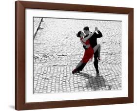 Couple dancing Tango on cobblestone road-null-Framed Art Print