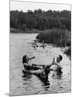 Couple Drinking Beer at Inner Tube Floating Party on the Apple River-Alfred Eisenstaedt-Mounted Photographic Print