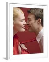 Couple Eating a Strand of Spaghetti from Both Ends-null-Framed Photographic Print