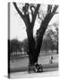 Couple Embracing in a Passionate Moment on the Bench in Hyde Park-Cornell Capa-Stretched Canvas