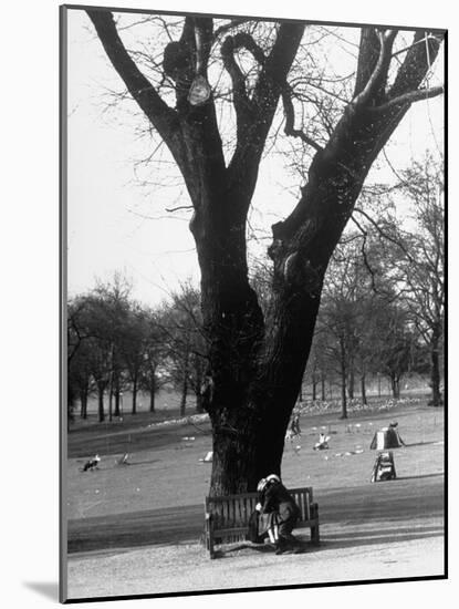 Couple Embracing in a Passionate Moment on the Bench in Hyde Park-Cornell Capa-Mounted Photographic Print