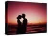 Couple Enjoying a Romantic Sunset on the Beach-Bill Bachmann-Stretched Canvas