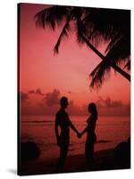 Couple Enjoying a Romantic Sunset on the Beach-Bill Bachmann-Stretched Canvas